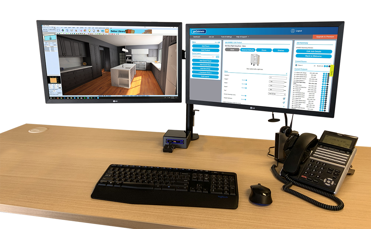 desktop double screen set up, with phone